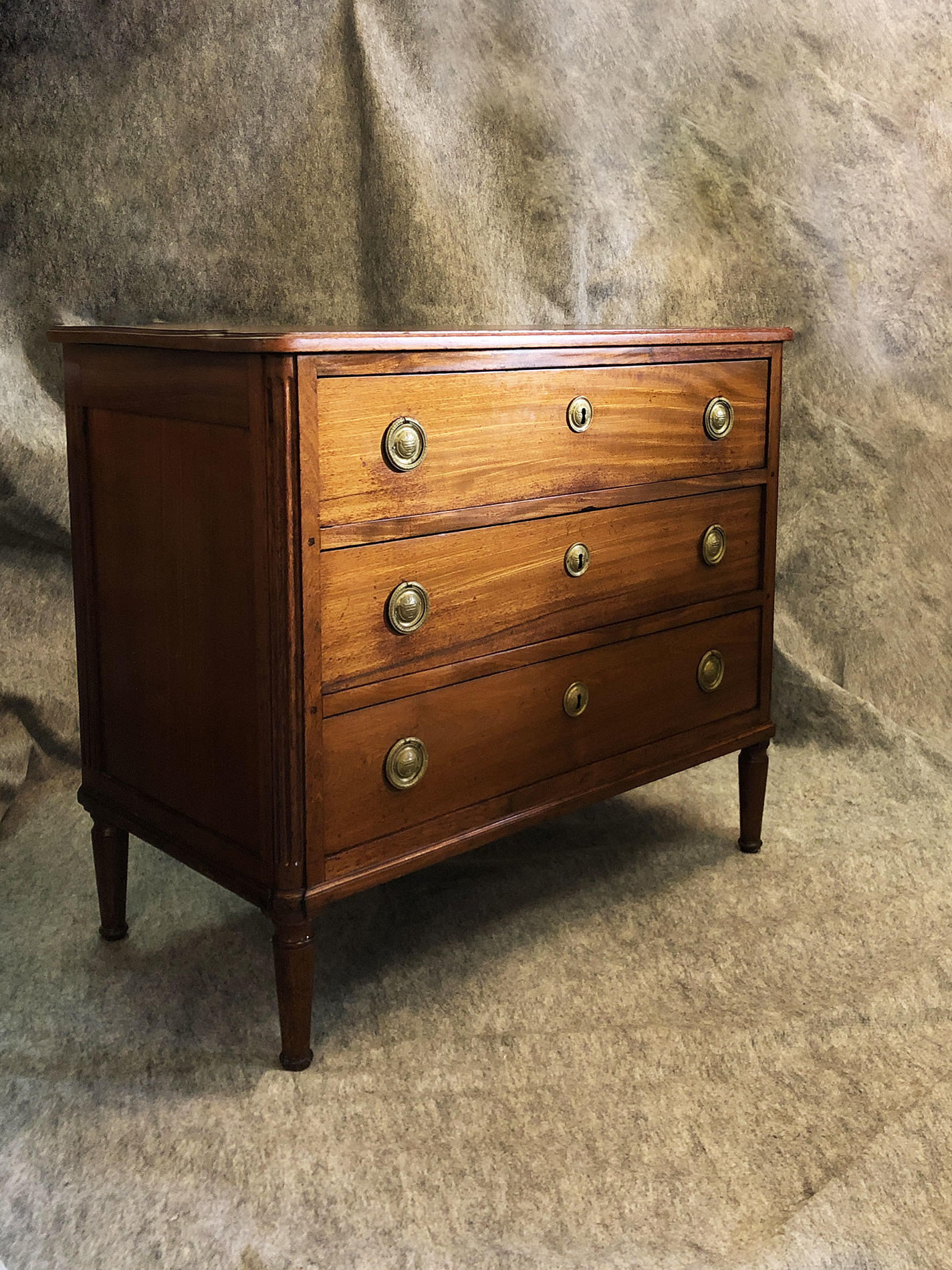 Directory Style Mahogany Chest of Drawers. France, 19th Century