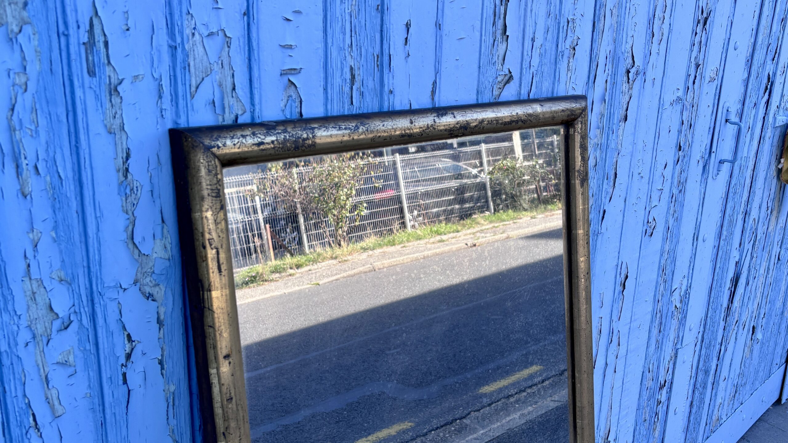 Miroir en bois doré, XXe siècle