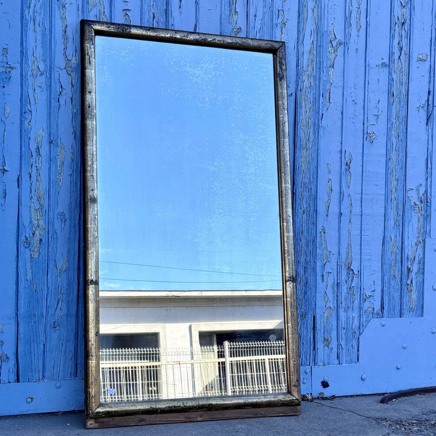 Miroir en bois doré, XXe siècle