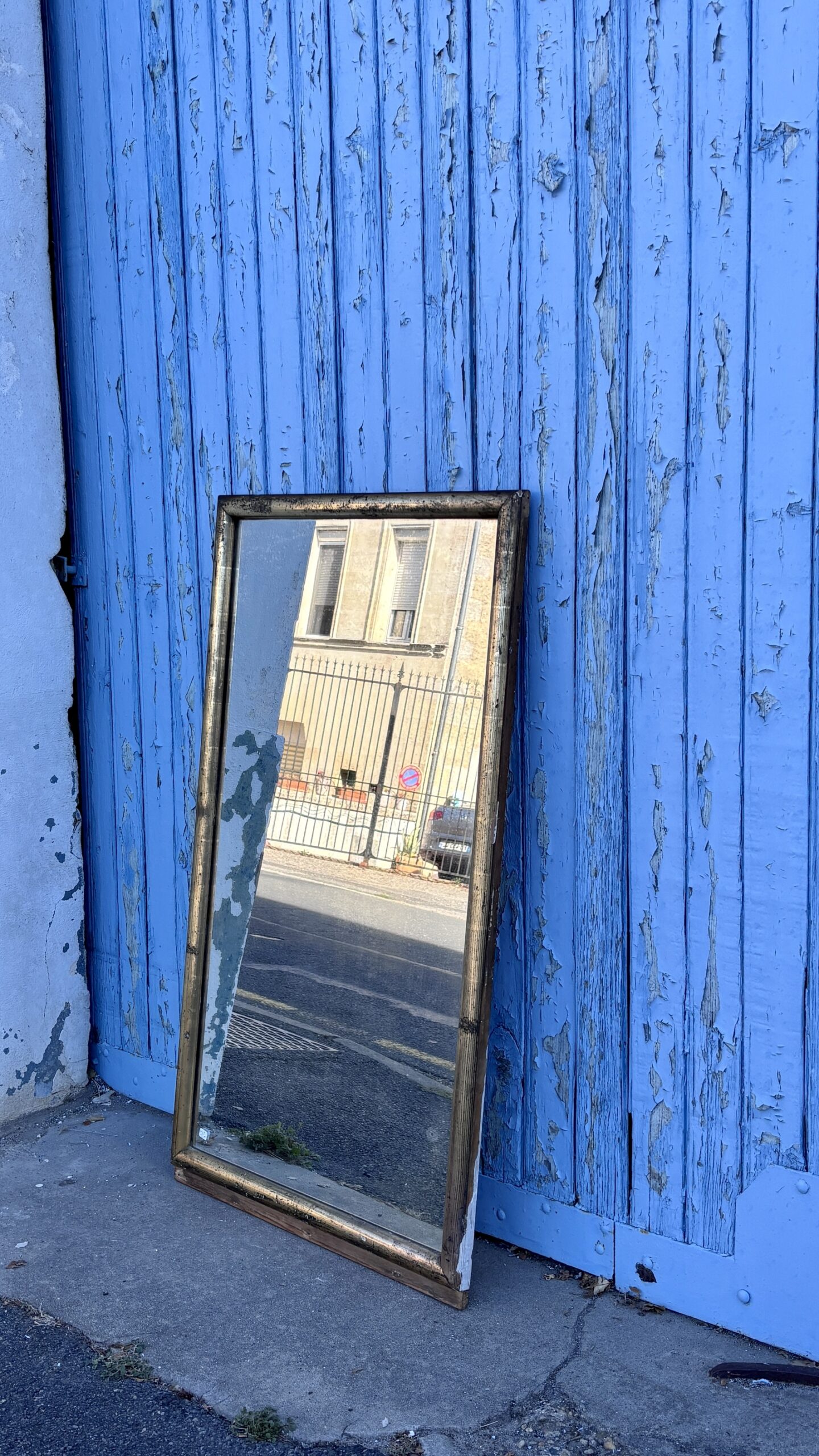 Miroir en bois doré, XXe siècle