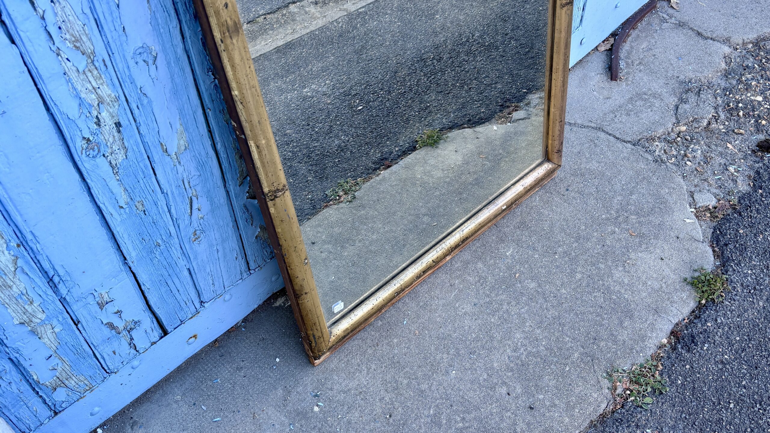 Miroir en bois doré, XXe siècle