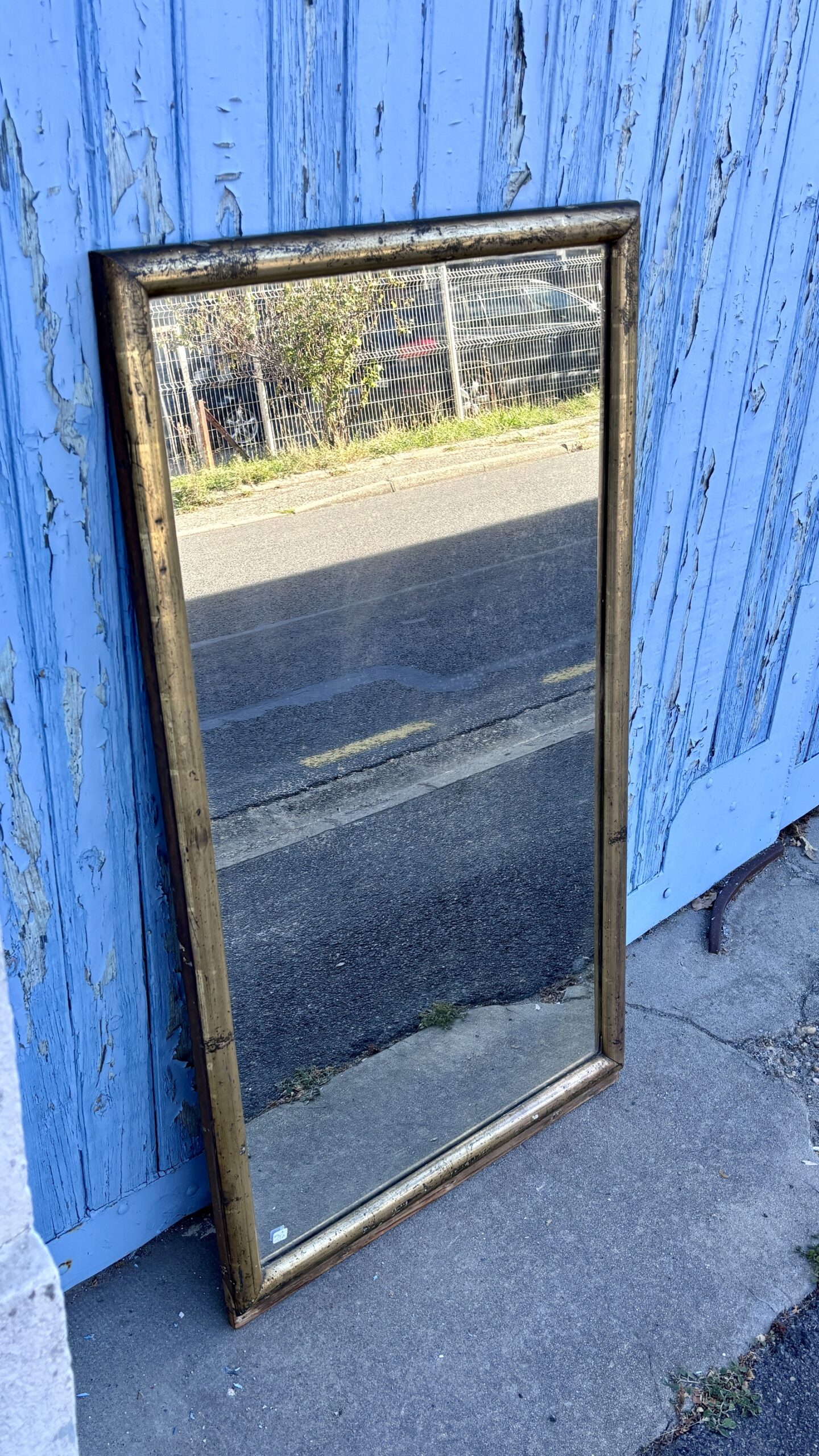 Miroir en bois doré, XXe siècle